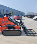 Side view of Small But Mighty Mini Skid Steer Loader with Leveler, 1800lbs capacity, on pavement