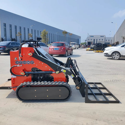 Side view of Small But Mighty Mini Skid Steer Loader with Leveler, 1800lbs capacity, on pavement