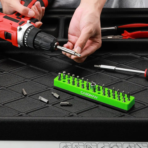 One Quarter Inch Hex Bit Organizer With Magnetic Base In Green Holds Up To Forty Three Hex Bits Built Tough Magnetic Bit Tray For Sockets And Drivers Durable Polypropylene Construction Compact 43 Bit Holder on workbench with tools