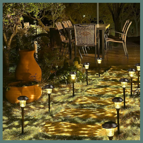 8 Pack Solar Pathway Lights Outdoor Warm White 3500K Waterproof LED Path Lights illuminating garden walkway at night