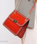 Framendino red leather handbag with gold-tone turn-lock clasp and chain strap