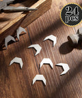 Heavy Duty Metal Drawer Stops For Dresser Track Guide Glides 24 Pack displayed on a wooden surface with tools.