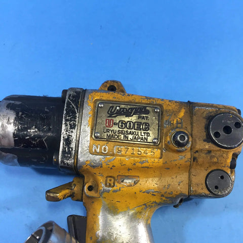 Heavy Duty Air Impact Wrench With 14 Pin Anvil Socket And Massive Torque Rating Built For Real Mechanics Who Need A Tough As Nails Tool To Rip Loose Stuck Fasteners Without Breaking A Sweat Daily, close-up view showing U-60EC model.