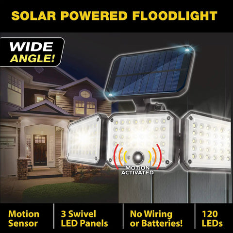 Bionic Motion Sensing Solar Powered LED Black Flood Light illuminating house, featuring 3 swivel LED panels and solar panel.