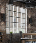 6 Inch Cylinder Outdoor Wall Sconce With 2 Light Up And Down Modern Aluminum Black Finish around industrial-style windows