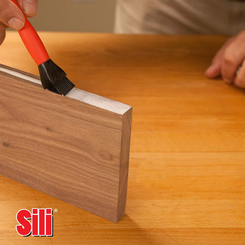 Silicone Glue Brush With One Inch Tip For Woodworking And Crafts applying glue on wood edge