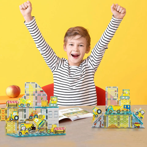 Magnetic Tile Idea Book With 300 Builds, 230 Page Illustrated Guide For Kids Ages 3 And Up, Includes Magnet Race Tracks And Marble Runs To Boost Creative Stem Play And Colorful Tile Creations. Child with magnetic tile construction layouts on table.