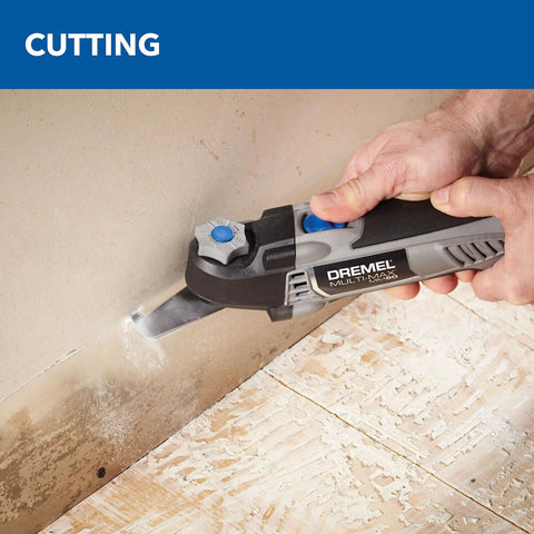 Person using 3.5 Amp Oscillating Tool Kit With Tool-Less Accessory Change, 12-Piece Set for drywall cutting