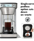 Front view of 12 Cup Coffee Maker With Podless Single Serve Function In Silver Heats Water To 194 To 205 F For Fast Flavorful Brews And Fits One Or A Crowd With Small Or Large Brew Baskets, Easy Home Kitchen Coffee Brewer with coffee being brewed.