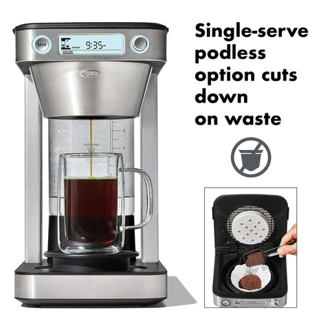 Front view of 12 Cup Coffee Maker With Podless Single Serve Function In Silver Heats Water To 194 To 205 F For Fast Flavorful Brews And Fits One Or A Crowd With Small Or Large Brew Baskets, Easy Home Kitchen Coffee Brewer with coffee being brewed.