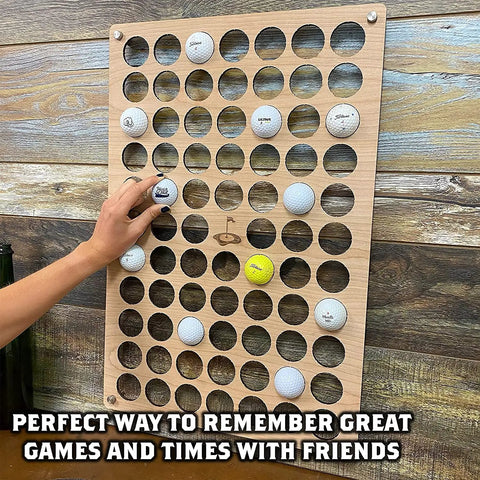 Customizable Golf Ball Display Case Wall Mount Holds 72 Balls on wooden panel with hand placing ball