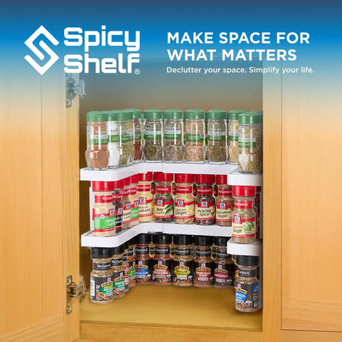 Expandable Two Tiered Spice Rack Organizer For Cabinet And Pantry Storage Kitchen Seasoning Holder With Non Slip Grip Pad inside cupboard holding various spice bottles.
