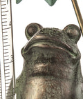 Close-up of Garden Frog Statue With Umbrella Glass Rain Gauge Weather Station for Outdoor Decor, showing rain gauge scale.