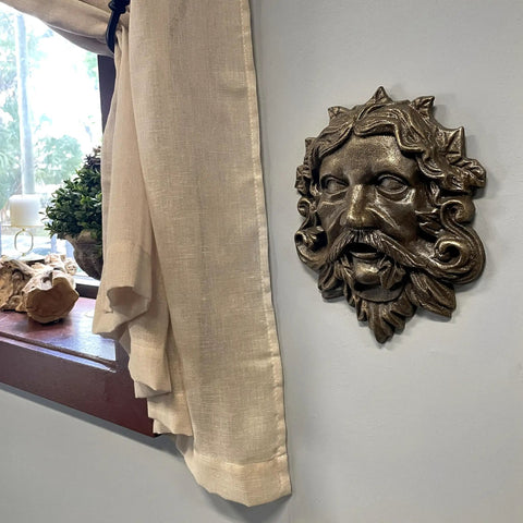 Top Tier Green Man Wall Decor, Slick 9.75 Inch Heavy Duty Cast Iron Plaque, Solid Bronze Finish, wall-mounted design with intricate detailing.