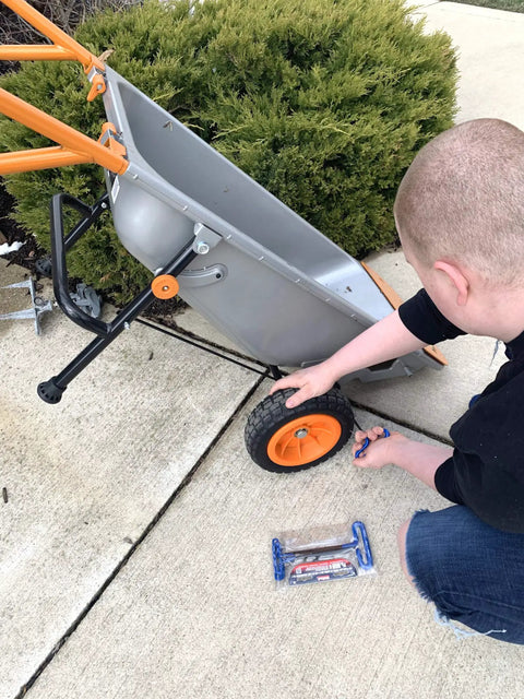 Person using Cushion Grip Hex T Key Allen Wrench Set, 8 Piece Metric MM Sizes 2-10, 9 Inch Shaft, on wheelbarrow tire