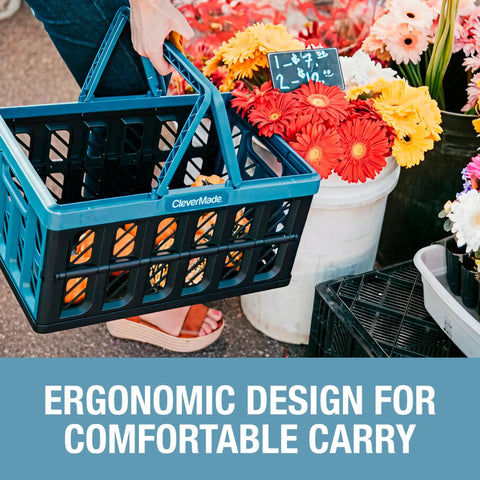 Woman carrying collapsible shopping basket with handles, 24L three pack, fold flat plastic storage bin at flower market