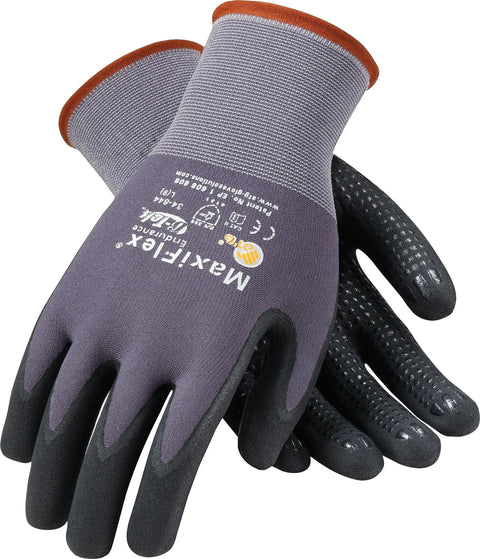 G Tek Coated Work Gloves With MicroFoam Nitrile Grip For Light Oils resting crosswise showing palm texture and logo