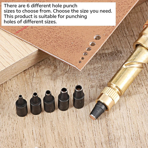 Slick Wooden Handle Bookbinding Tool With Six Interchangeable Tips Adjustable Leather Hole Punch with various size tips on wood.