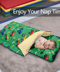 Child sleeping in Detachable Toddler Nap Mat With Pillow And Blanket Thickened Extra Large Sleeping Bag, green truck print.