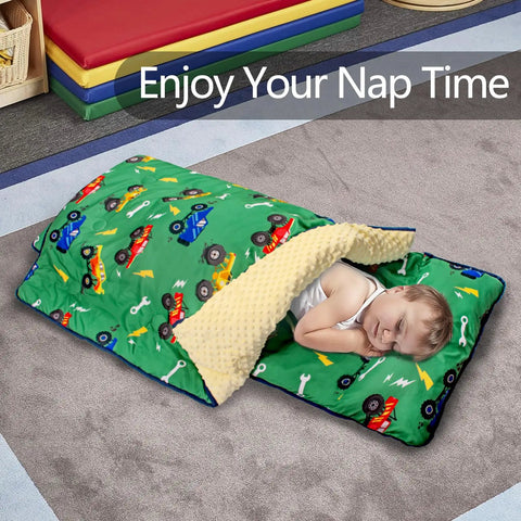 Child sleeping in Detachable Toddler Nap Mat With Pillow And Blanket Thickened Extra Large Sleeping Bag, green truck print.