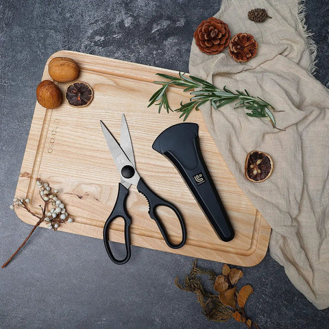 Magnetic Kitchen Scissors All Purpose Heavy Duty Shears With Break Apart Blades For Meat Poultry Veggies Herbs And Pizza Dishwasher Safe Black With Magnetic Holder For Easy Cleaning And Precise Cutting On Every Kitchen Task. 8.1-inch black shears with magnetic holder on cutting board