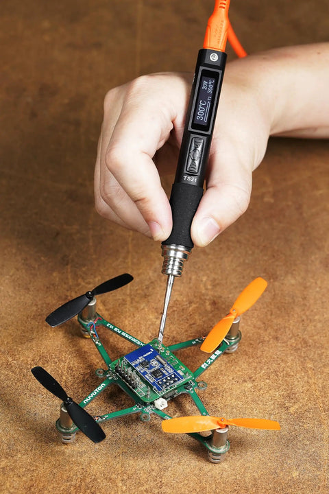Using TS21 Pro Grade Soldering Iron Kit With Adjustable Temperature USB Type C Power Station Digital OLED Display KU Solder Tip on circuit board