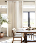 Cream Linen Look Curtains For Living Room 86 Inch Long 2 Panels 52Wx86L Semi Sheer Light Filtering Privacy Track System With Back Tabs And Tiebacks Beige White Pleated Drapes installed in dining room with wooden furniture.