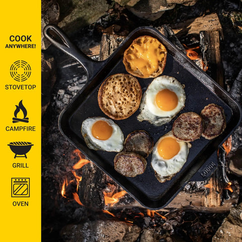 Seasoned Cast Iron Square Griddle Pan, 11 Inch Durable Cookware with eggs and sausage cooking over campfire