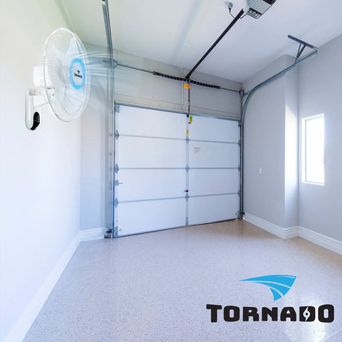 16 Inch Oscillating Wall Mount Fan With Remote Control 3 Speed 2050 CFM in a garage with white walls