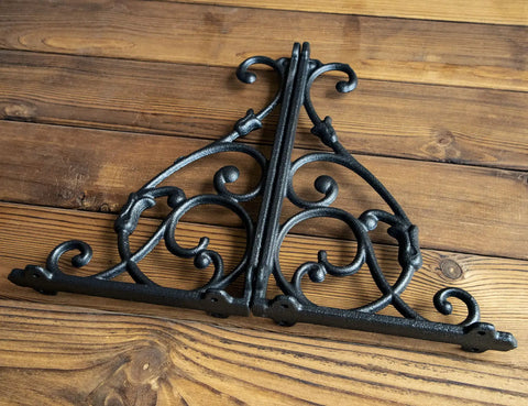 4 Pack Badass Cast Iron Shelf Brackets 11 By 7.5 Inch Antique Black Corbels With Screws And Anchors Built To Last, showing a retro vine pattern.