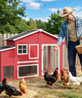 Man feeding chickens in front of Backyard Chicken Coop For 4 To 6 Hens, 84.7 Inch Long Outdoor Hen House With Nesting Box, red