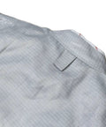 Back view of Pro Grade Lame Fencing Vest For Foil And Saber Practice And Competition, close-up of metallic fabric texture.