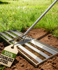 Pro Grade Stainless Lawn Leveling Rake 30 Inch Heavy Duty Ground Leveler on grass with 100% stainless steel tag
