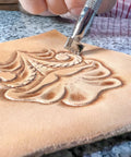 Leather Stamping Tool Set for Crafting, 10 Sheridan Style Stamps Includes Lifter, Bar Grounder, Mulesfoot, in use on leather piece.