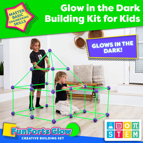 Two kids building with Glow In The Dark Fort Building Kit For Kids 81 Pack With 53 Rods And 28 Spheres STEM Construction Toys