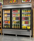 Top Shelf Heavy Duty Commercial Reach In Refrigerator With Three Glass Doors And Seventy Two Cubic Feet Of Stainless Steel Upright Merchandiser featuring vibrant beverages and fresh produce.