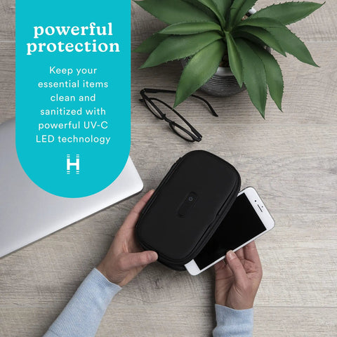 Person using UVC Portable Sanitizer Box With Rechargeable Battery Kills Ninety Nine Point Nine Percent Germs On The Go Fits Masks Makeup Brushes Glasses Phones Keys Black on a smartphone with accessories nearby.