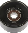 Front view of Dorman 419-605 belt idler pulley, black housing with metal bearing and brown inner race