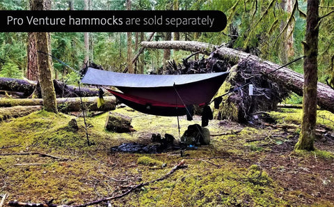 Waterproof Hammock Rain Fly Hex Tarp 12 By 9 Feet over hammock in forest, premium lightweight ripstop nylon provides shelter.