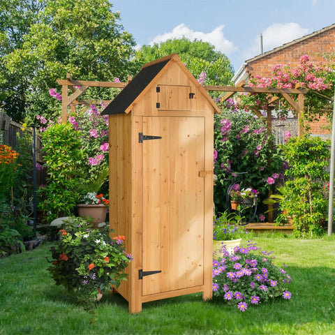 Front view of Outdoor Wooden Storage Shed With Safety Latch Teak Finish Durable Garden Tool Cabinet in a lush garden setting.