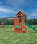 Atlantis Cedar Wood Swing Set With Wave Slide And Raised Clubhouse Featuring Rock Wall, Belt Swings, Sandbox Area in Backyard