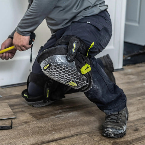 Person using Dual Gel Foam Knee Pads With Comfort Hinge All Day Cushioning And Non Marring Caps for flooring work