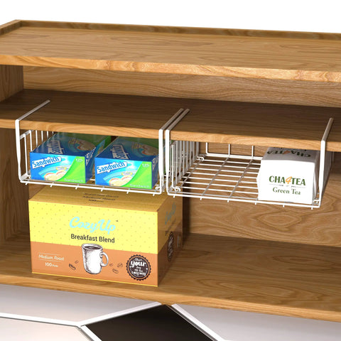 Hella Versatile Two Pack Under Shelf Wire Baskets White Metal Drop Down Organizers holding snacks and tea in kitchen pantry.