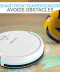 Smart Automatic Robot Vacuum Cleaner With 90 Minute Runtime And Self Path Navigation avoids obstacles near toy ball.