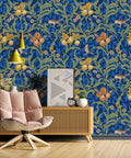 Vintage Bird Peel and Stick Wallpaper in Blue Floral Pattern decorating a living room wall with chair and cabinet décor.