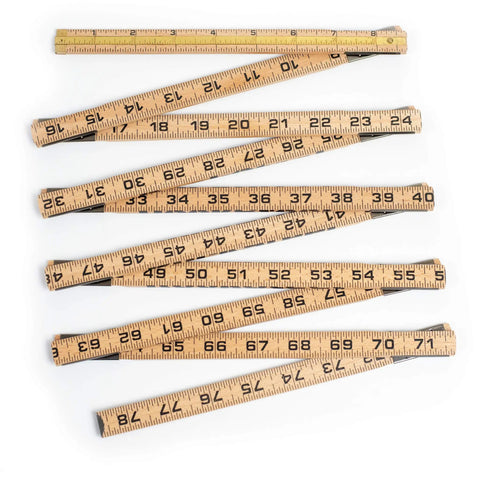 Folding Ruler With Brass Slide Rule For Carpenters And Tradesmen, Heirloom Wooden Measuring Stick shown fully extended, dual scales visible.