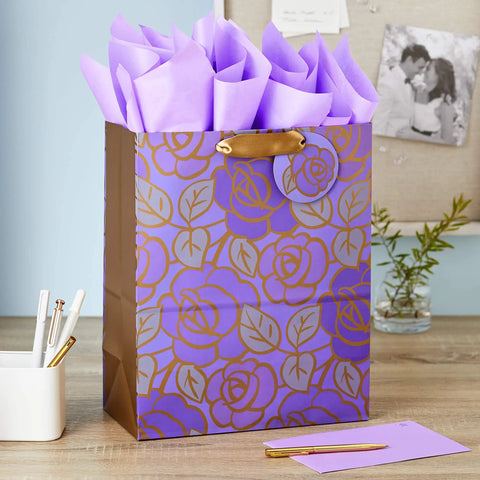 Large Purple Floral Gift Bag With Gold Foil Accents, Satin Ribbon Handles, And Purple Tissue Paper, 13 Inch Tall on desk