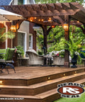 Top Shelf Dark Walnut Exterior Wood Stain and Sealer Turbo Spray System on a stylish wooden deck with seating area.