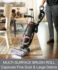 Commercial Grade Upright Vacuum Featuring Adaptive Surface Sensing Automation Alongside Long Lasting Motors in a dining room.