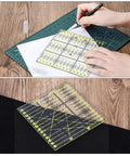 Using patchwork ruler from All In One Do It All Rotary Cutter Kit For Sewing And Quilting 104Pcs on cutting mat